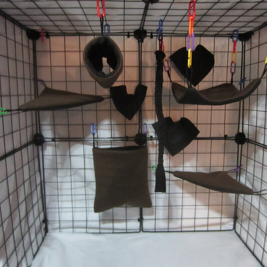 9pc brown fleece sugar glider cage set with pouch, hammock, and accessories for an earth theme glider habitat.