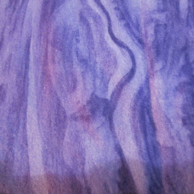 Close-up of lavender marble fleece fabric used in sugar glider cage sets, featuring soft swirls of purple and white.