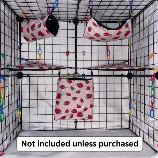 Pink strawberry sugar glider cage set with black fleece interior of pouches, hammocks, shelves, bridge, and braided rope inside a display cage.