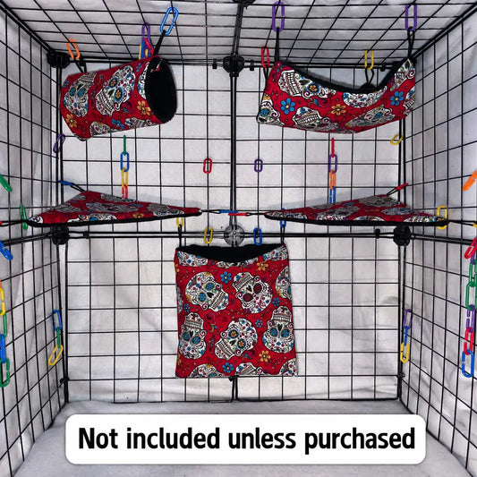 Red sugar skull sugar glider expansion cage set with black fleece for interior of pouches, hammock, corner shelves, and colorful C-links inside a display cage.