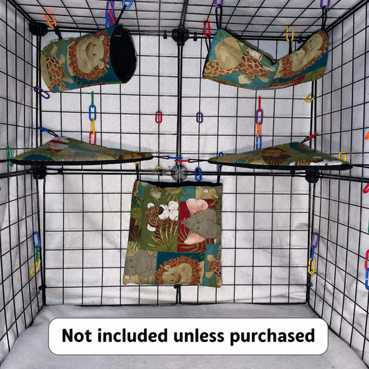 Safari animal print sugar glider expansion cage set with black interior lined pouches, hammocks, corner shelves, and colorful C-links inside a display cage.