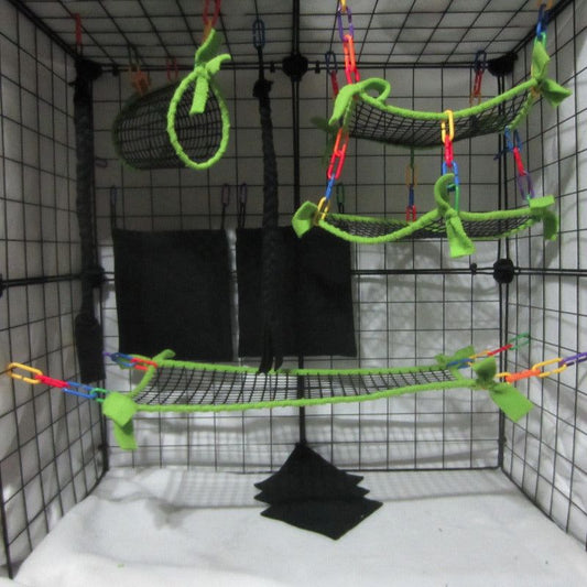 11-piece neon green mesh sugar glider cage set, including bedding, pouches, and accessories for small pet cages.