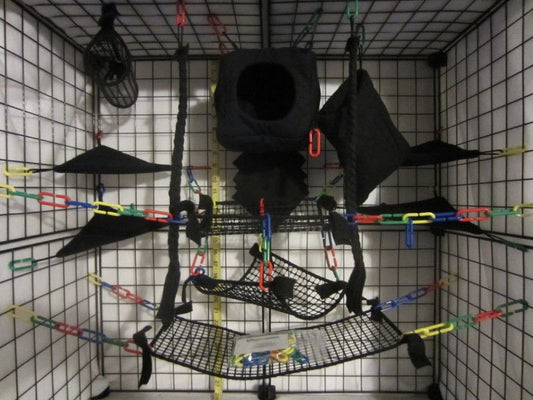 15-piece black mesh cube sugar glider cage set with breathable pouches, hammocks, and accessories for active gliders.