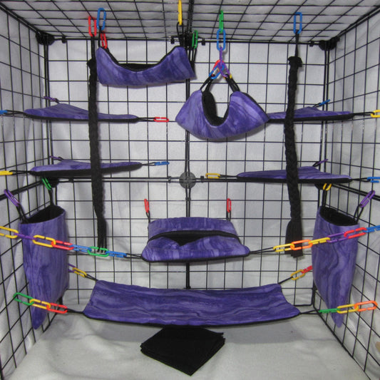 17-piece lavender marble fleece sugar glider cage set with hammocks, pouches, and cozy cage accessories.