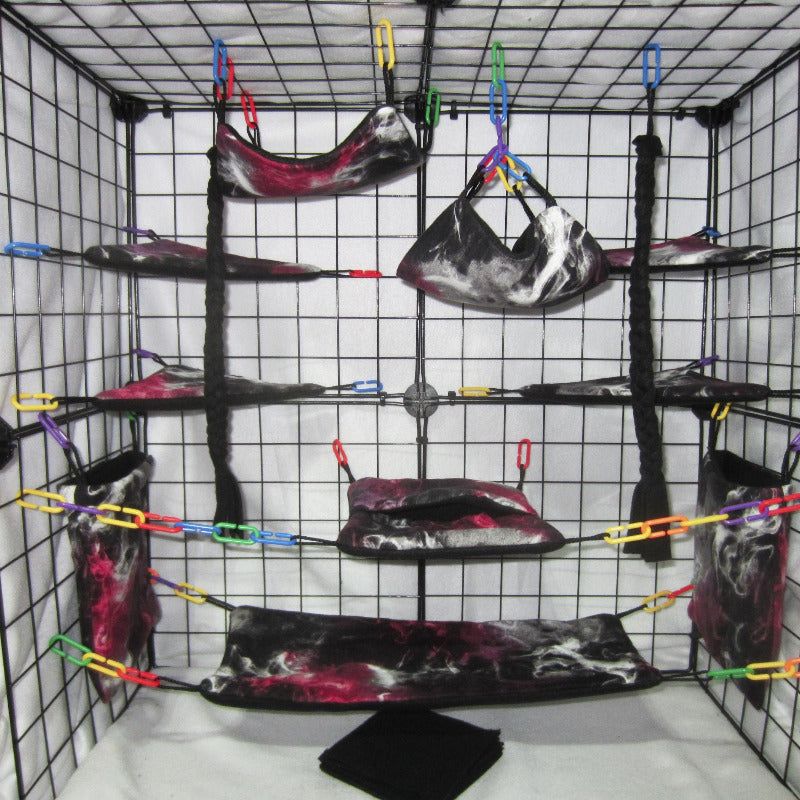 17-piece red and black smoky print fleece sugar glider cage set with hammocks, pouches, and cozy accessories for your glider.