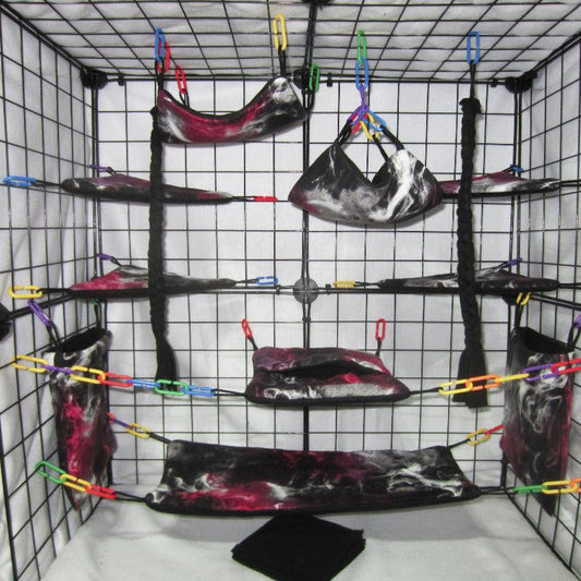 17-piece red and black smoky print fleece sugar glider cage set with hammocks, pouches, and cozy accessories for your glider.