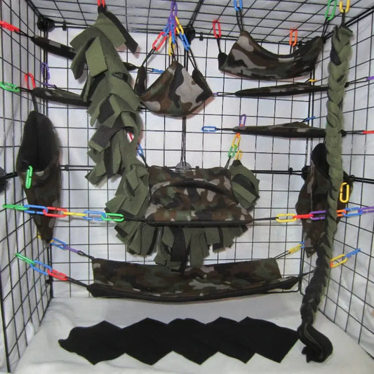 Large 17pc camouflage cage set shown in metal display cage with large jungle vine. 