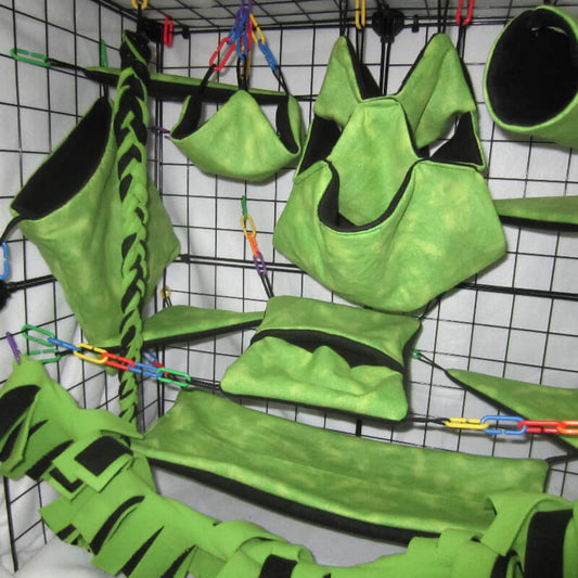 Angled view of jungle green fleece sugar glider cage set showing layout of accessories