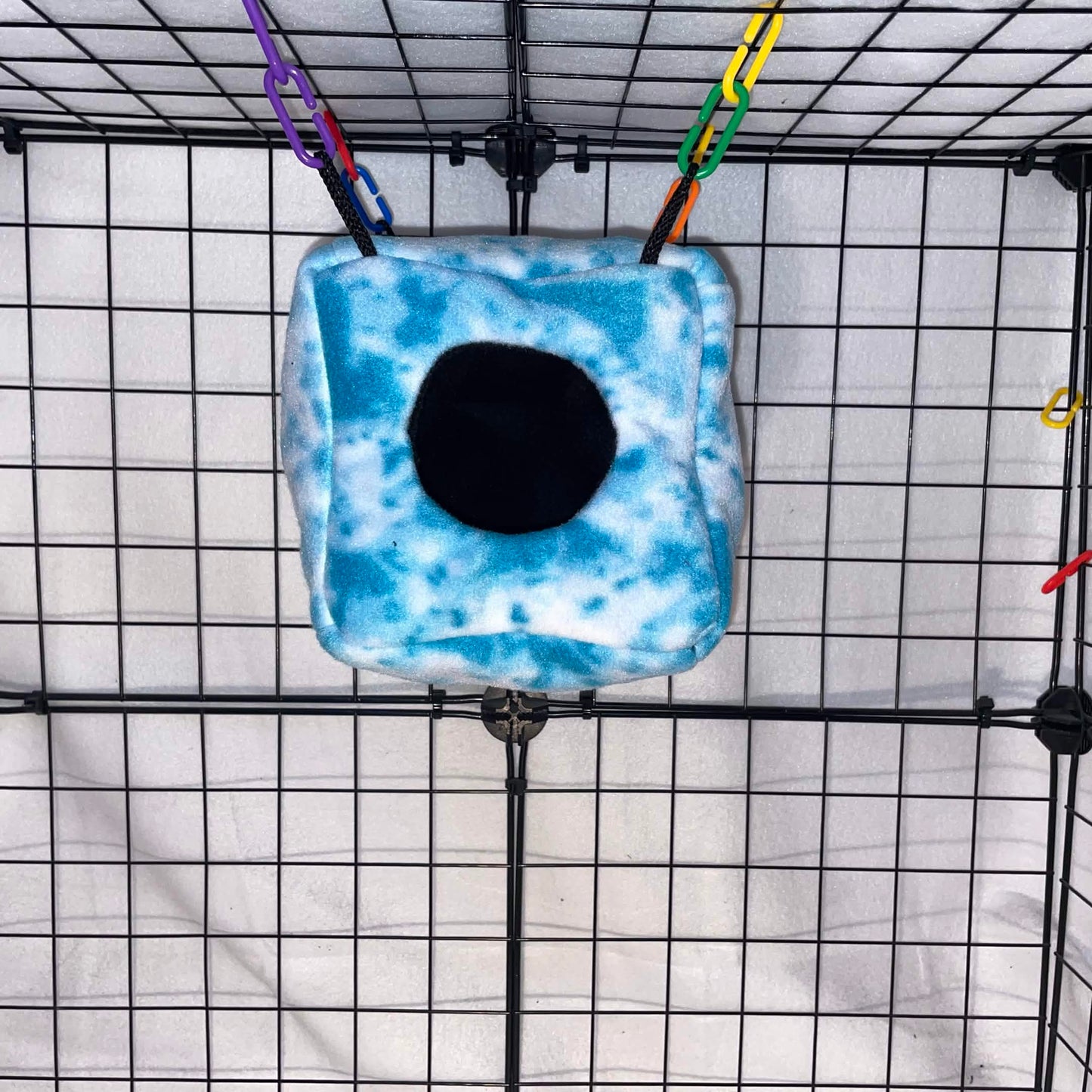 Blue sky tie-dye sugar glider cube hideout made with soft fleece for cozy sleeping, climbing, and cage enrichment. Handmade in the USA.