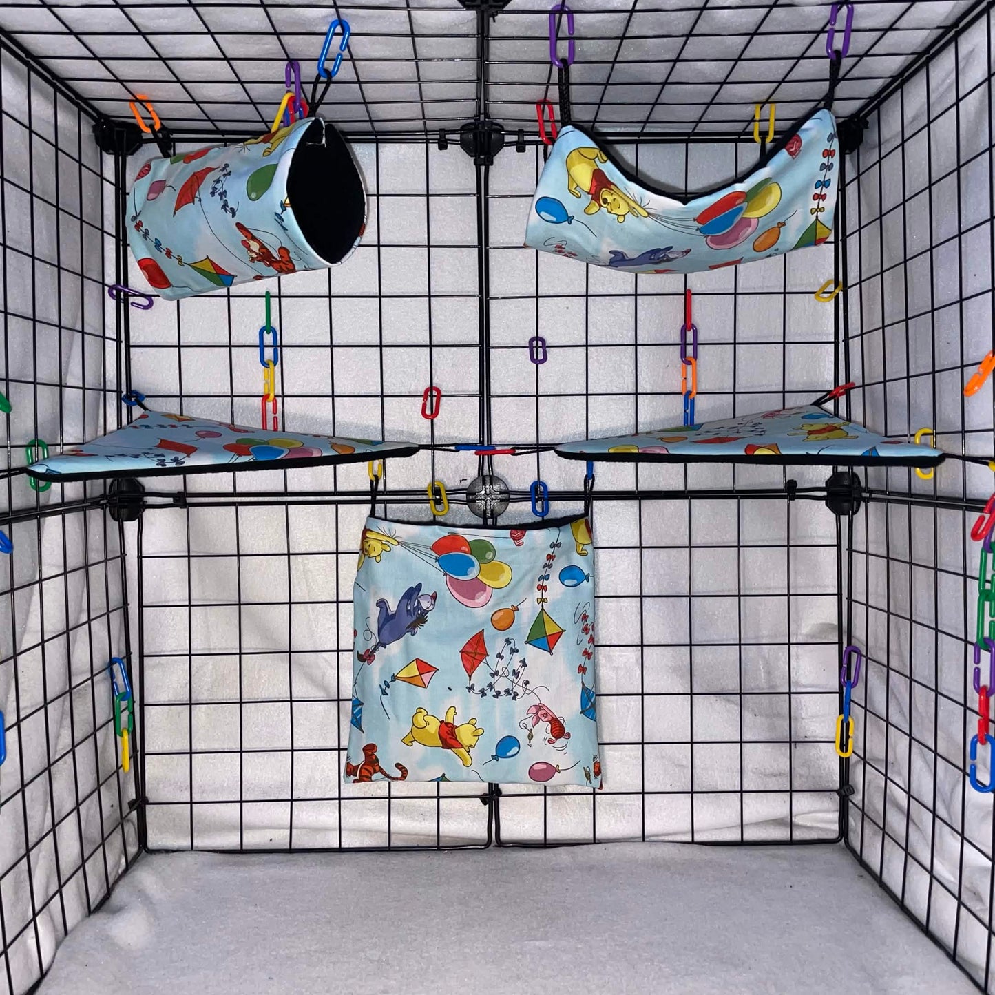Light blue balloon and kite print sugar glider expansion set with tunnel, hammock, corner shelves, and hanging fleece pouch.