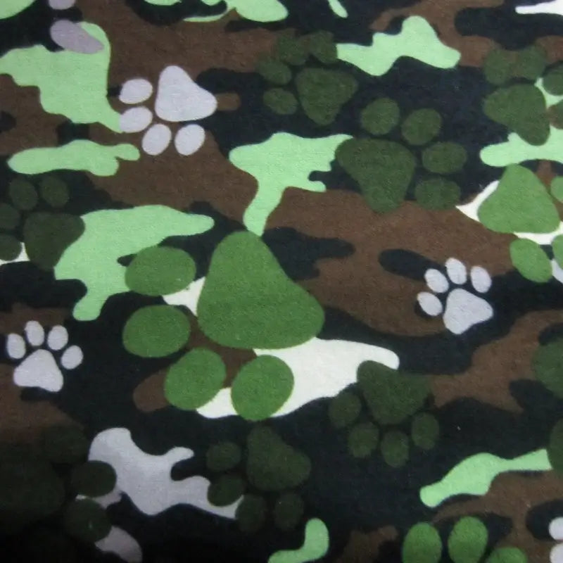A close up of the fabric print that is used in Glideramazing.com 17 paw camo sugar glider cage sets.