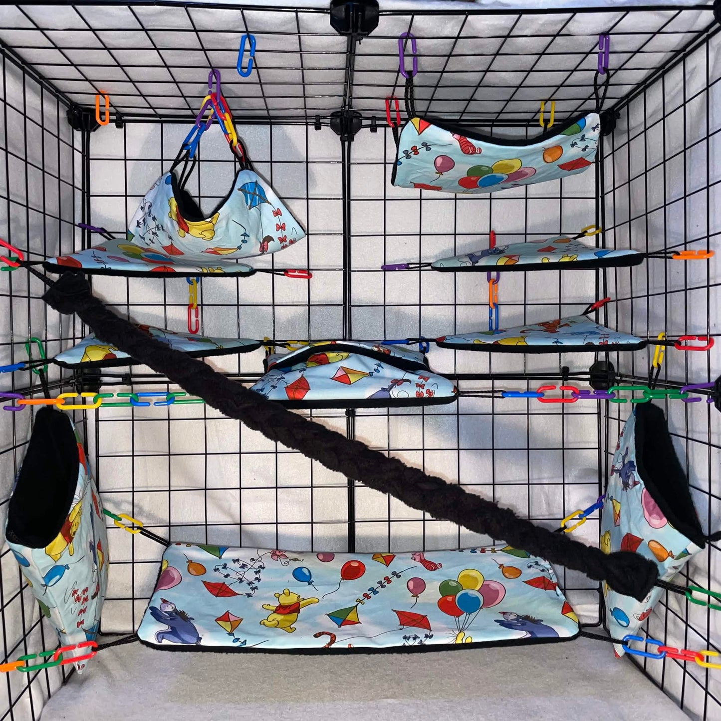 Pooh on Light blue balloon and kite print sugar glider cage set with hammocks, pouches, bridges, shelf liners, and black fleece vine.