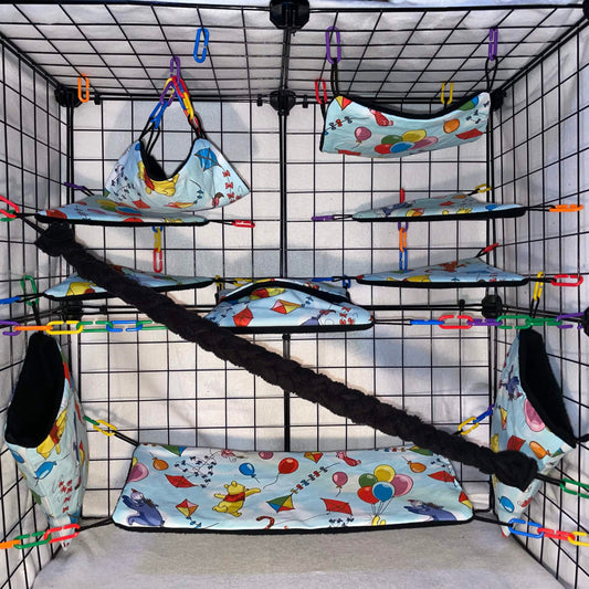 Pooh on Light blue balloon and kite print sugar glider cage set with hammocks, pouches, bridges, shelf liners, and black fleece vine.