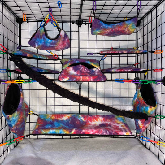 Rainbow tie-dye sugar glider cage set with hammocks, pouches, bridges nand fleece vine. Handmade cage accessories for pet gliders.