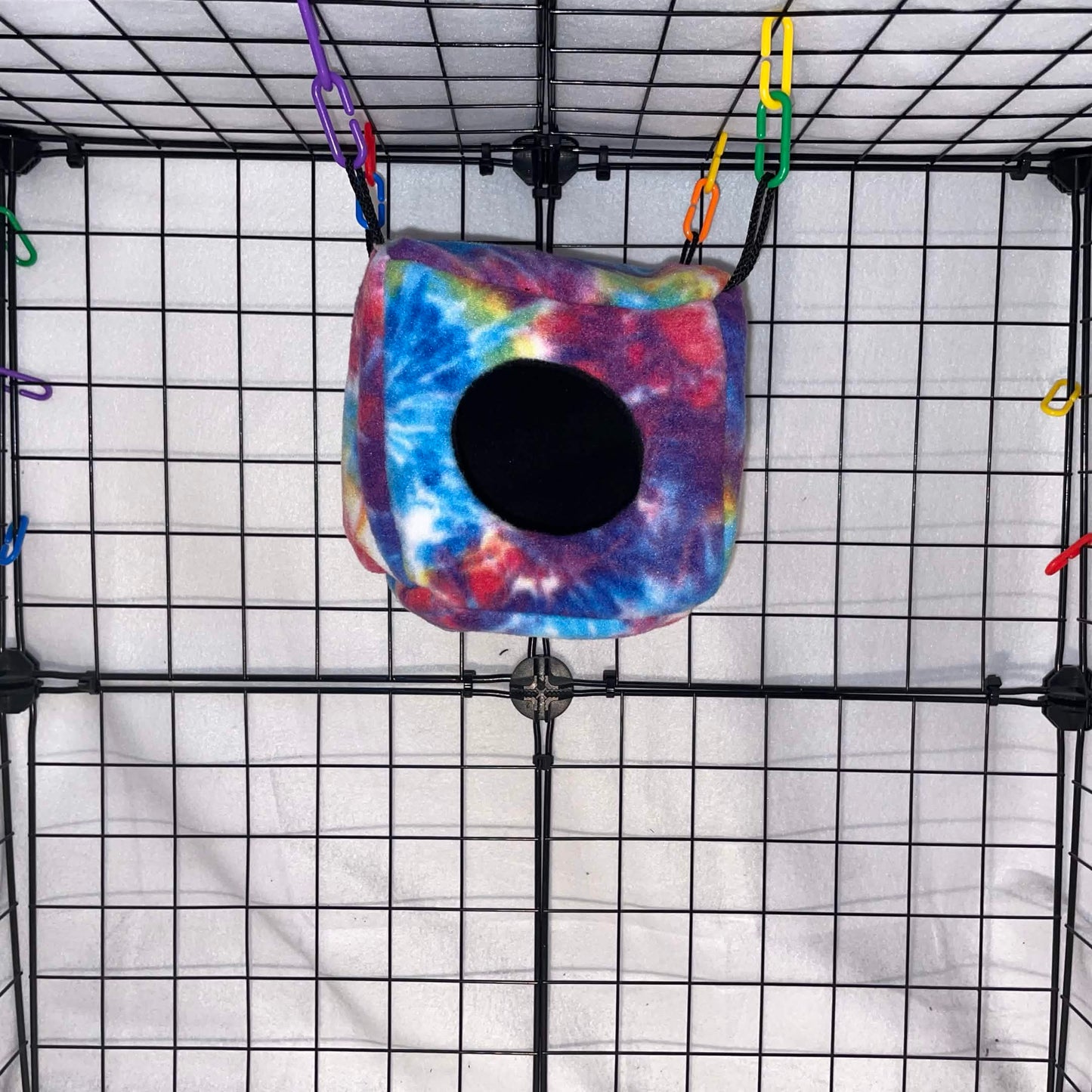 Rainbow tie-dye sugar glider cube hideout made with soft fleece for cozy sleeping, climbing, and cage enrichment. Handmade in the USA.