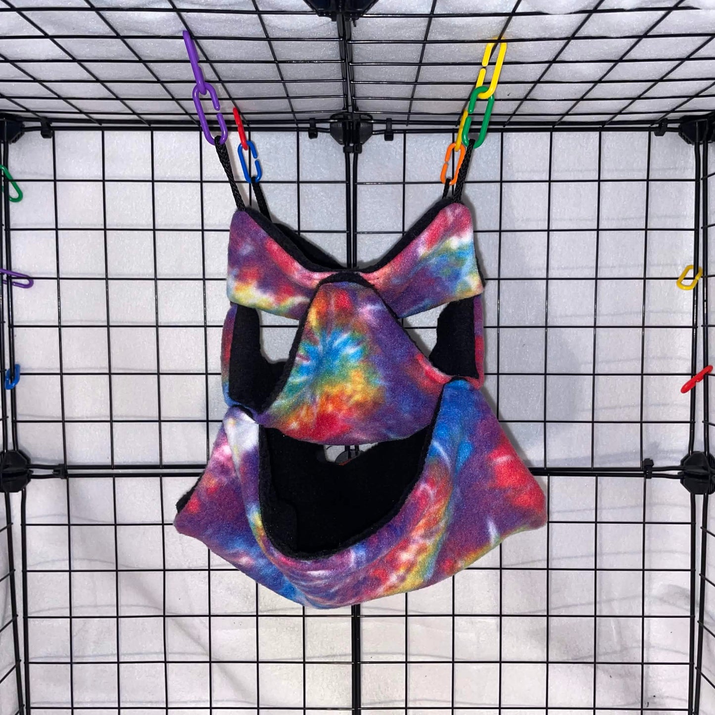 Rainbow tie-dye 3-tier honeycomb hammock for sugar gliders, made with soft fleece for cozy nesting, climbing, and cage enrichment.