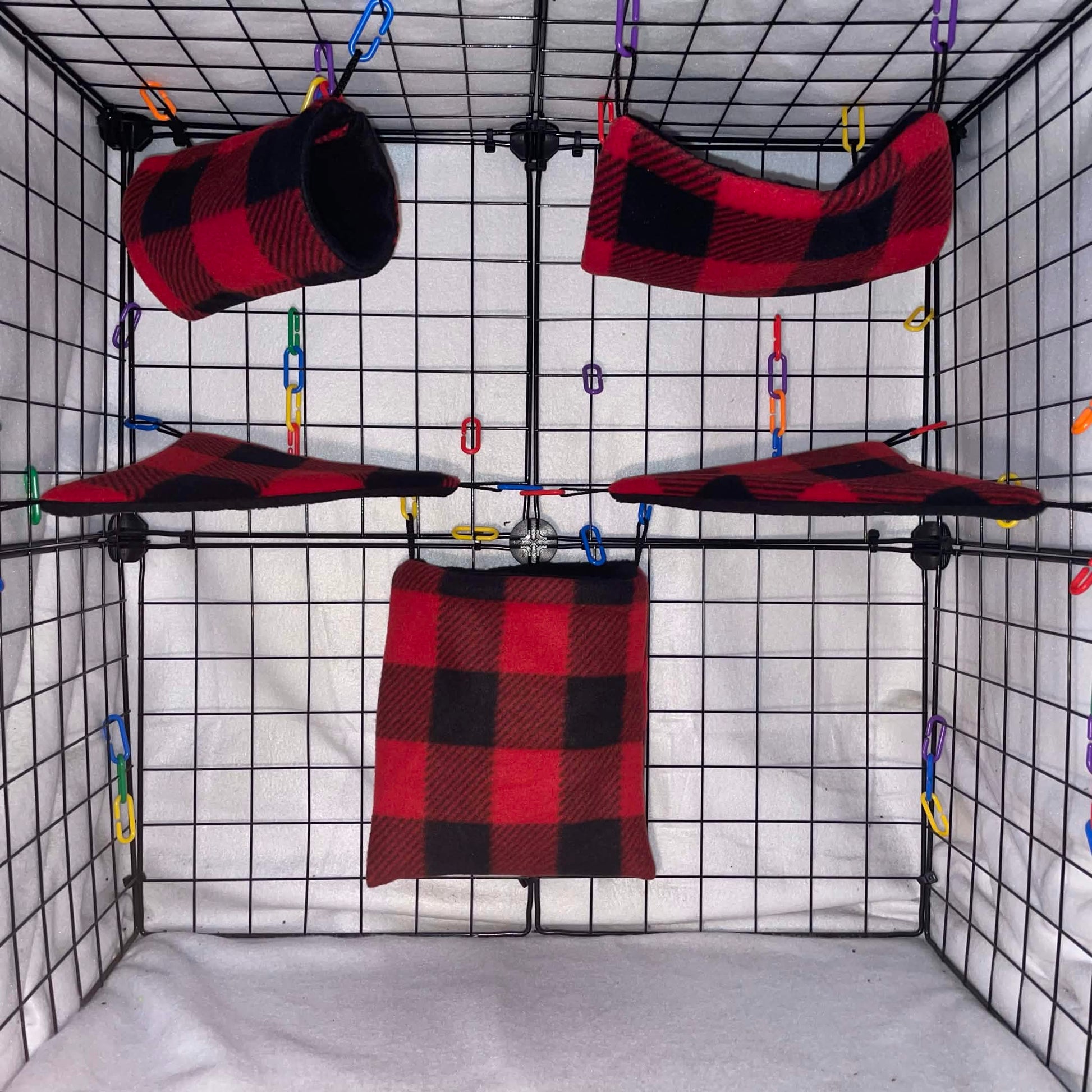 Red buffalo plaid sugar glider expansion set with tunnel, hammock, shelves, and fleece accessories. Handmade cage add-ons for cozy glider play.