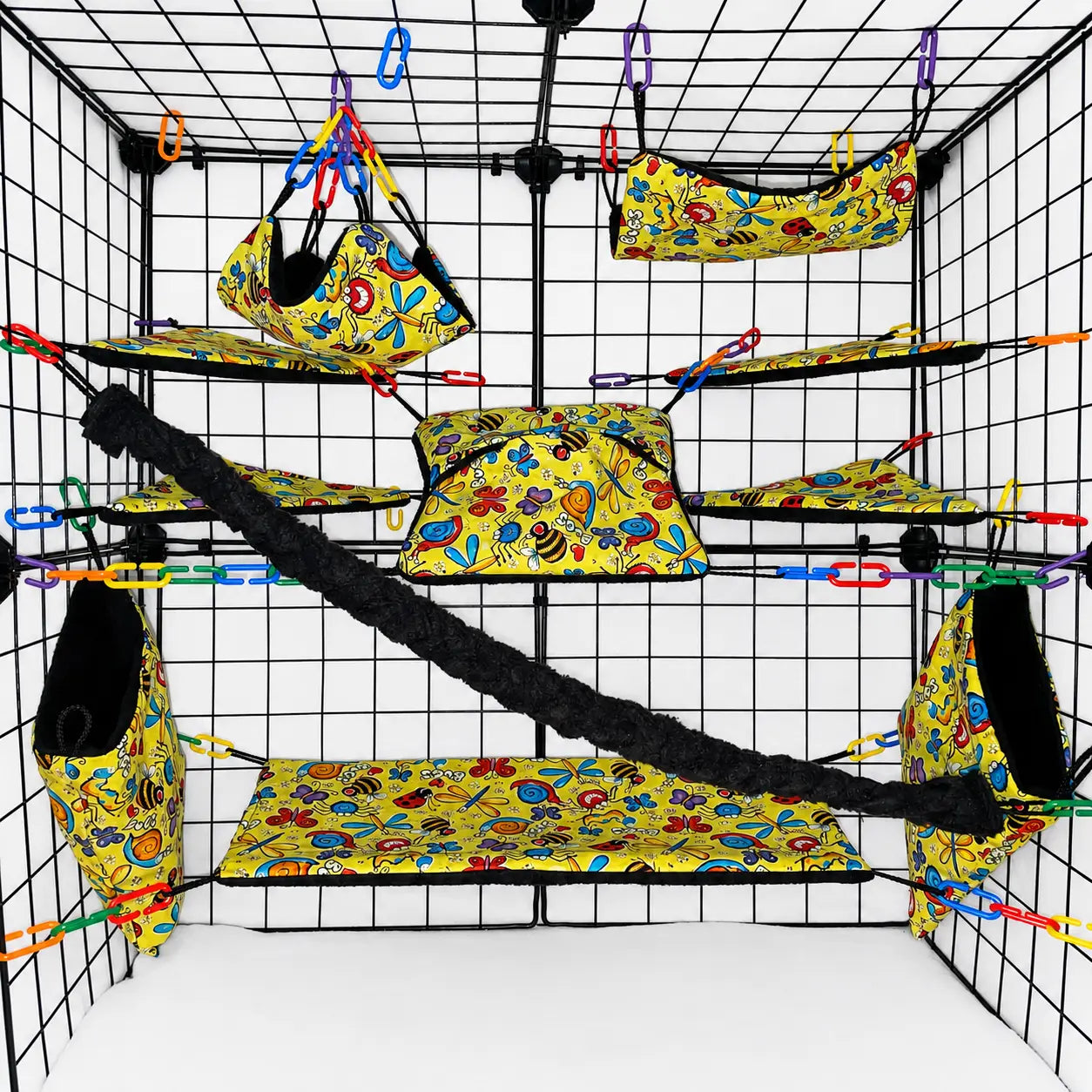 Yellow bug print sugar glider cage set with hammocks, pouches, bridges, and black fleece vine.