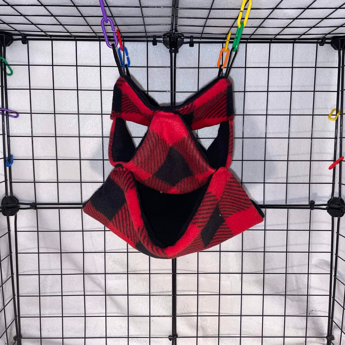 Red buffalo plaid 3-tier honeycomb hammock for sugar gliders, made with soft fleece for cozy nesting, climbing, and cage enrichment.